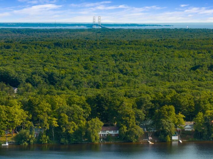 Property Photo:  7760 Paradise Trail  MI 49718 