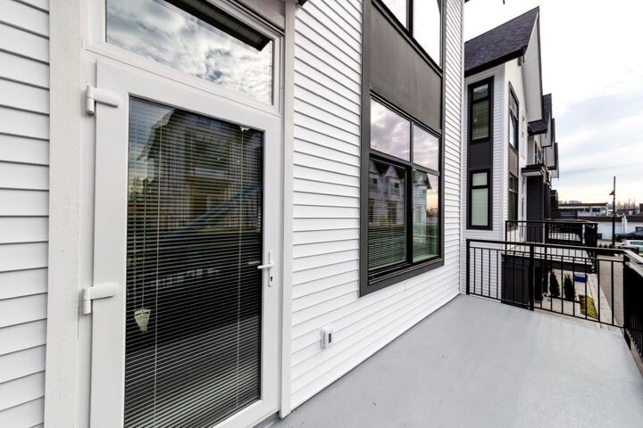 Property Photo: 17555 57A Avenue 21 BC V3S 7V2