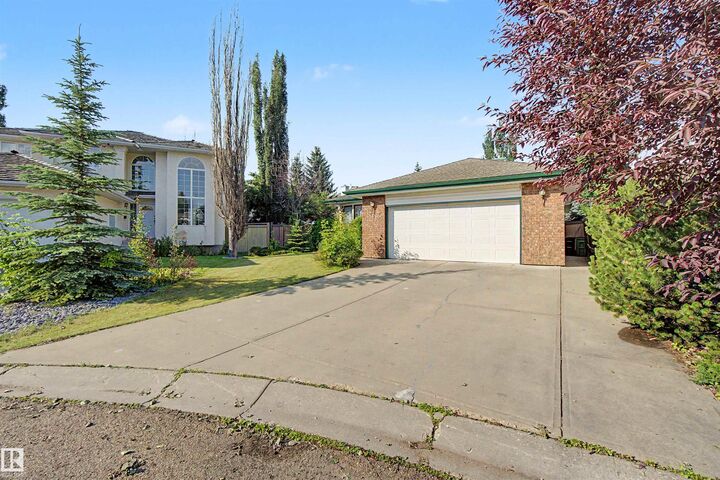 Property Photo: 711 Butterworth Drive NW AB T6R 1P5