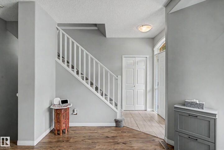 Property Photo:  9130 100A Avenue NW  AB T5H 4N7 