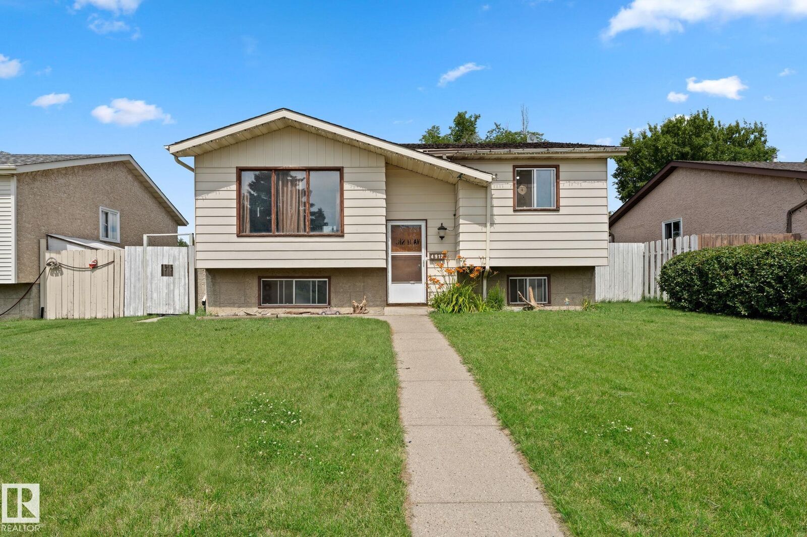 Property Photo:  4912 11A Avenue NW  AB T6L 4A4 