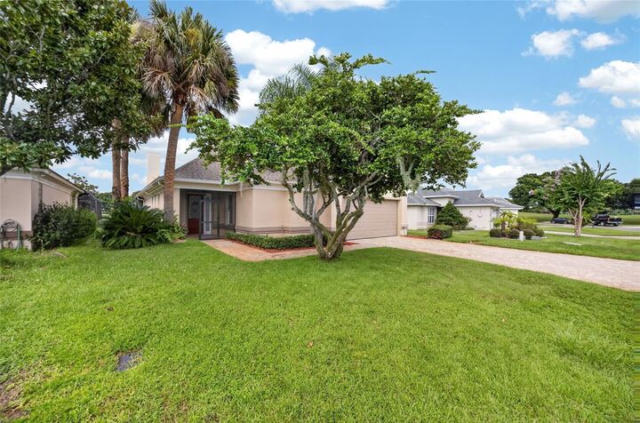 Property Photo: 30089 Island Club Drive FL 32778