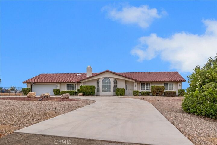 Property Photo:  18664 Plumas  CA 92345 