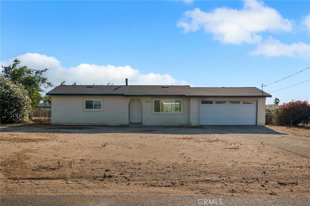Property Photo:  10690 Cypress  CA 92345 