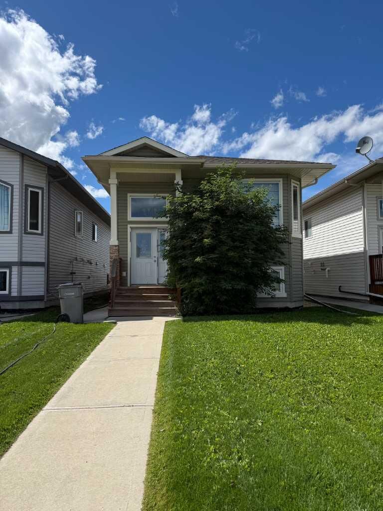 Property Photo: 7418 112 Street AB T8W 0C6