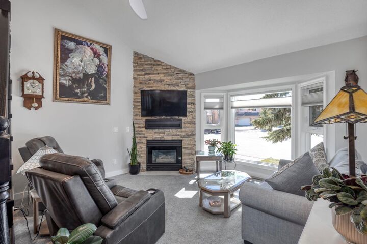 Property Photo: 26 Quigley Drive 7 AB T4C 1M2