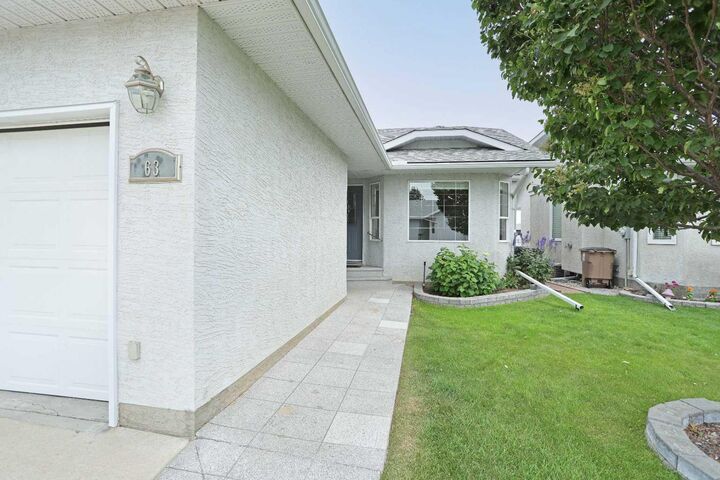 Property Photo: 63 Lu-Dor Close E AB T1R 1G2