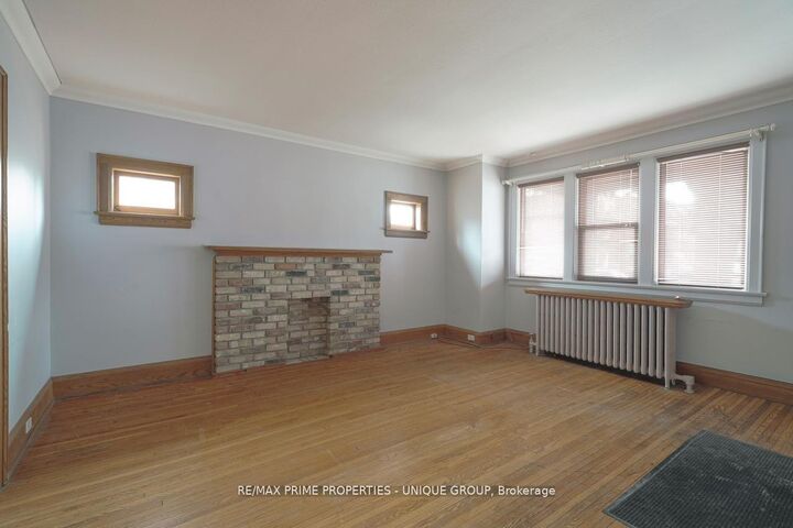 Property Photo:  1 Bonfield Avenue Main  ON M4E 1B9 