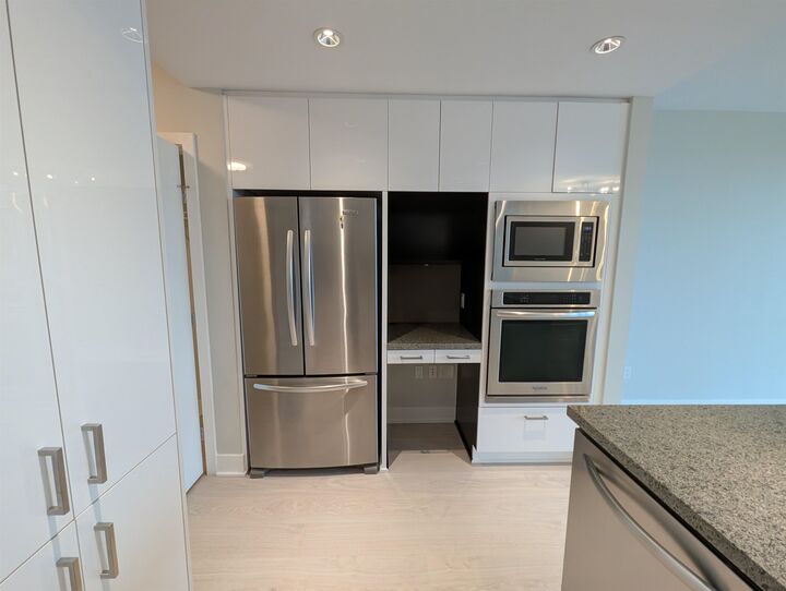 Property Photo: 3008 Glen Drive 1208 BC V3B 0J5