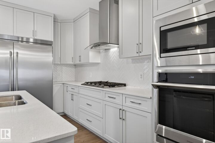 Property Photo:  3647 214 Street NW  AB T6M 1S3 