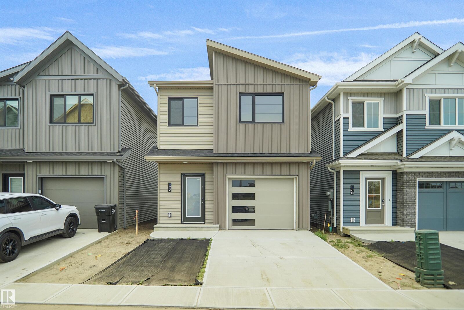 Property Photo: 1430 Aster Way NW 27 AB T6T 2N8