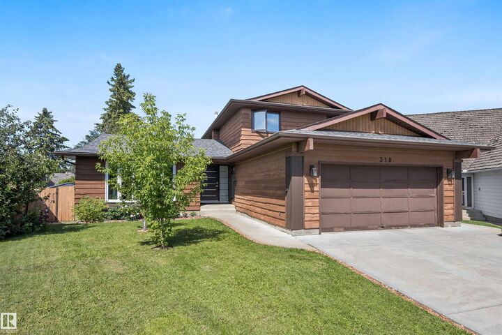 318 Grand Meadow Crescent NW — photo 1