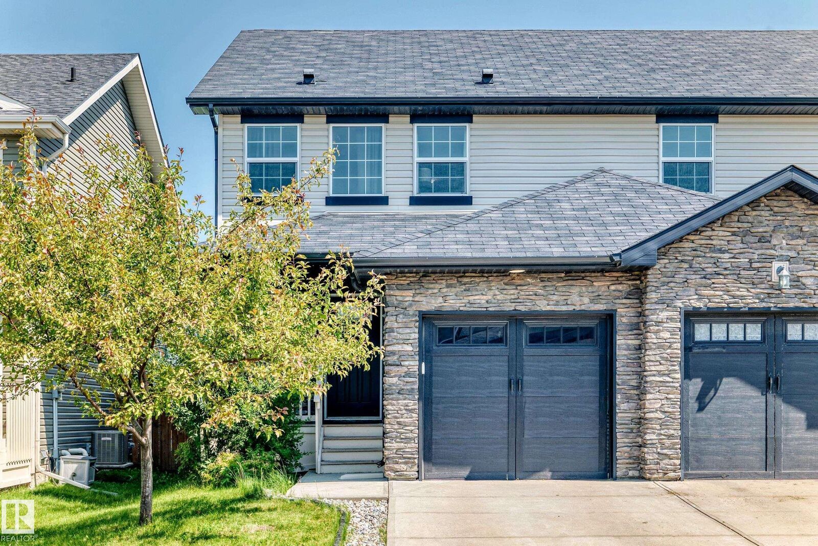 Property Photo: 7481 Ellesmere Way AB T8H 0P6