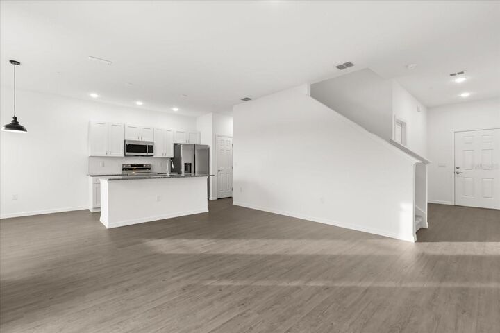 Property Photo:  915 Lakefront Village Drive  FL 34711 
