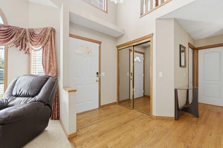 Property Photo: 71 Woodpark Close SW AB T2W 6G9
