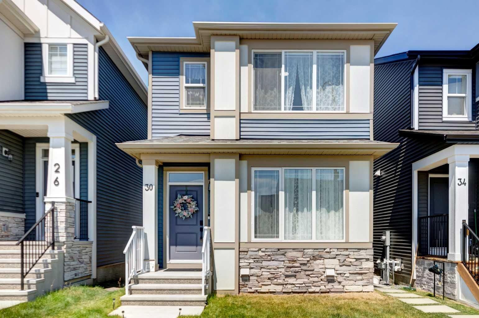 Property Photo: 30 Creekside Manor SW AB T2X 5S2