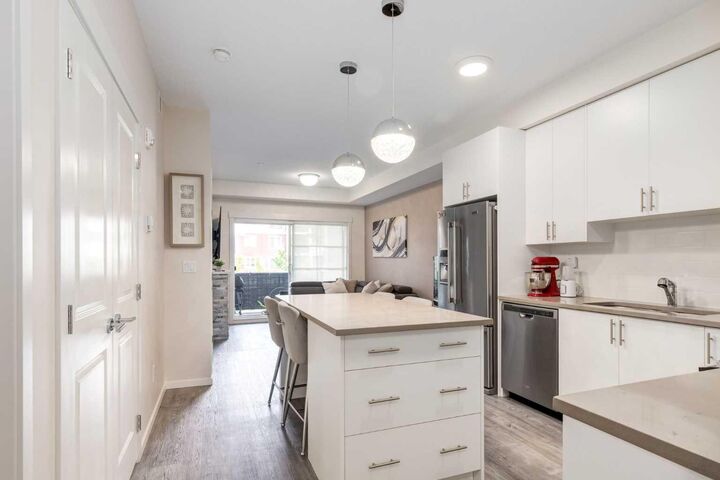 Property Photo:  151 Legacy Main Street SE 8205  AB T2X 4A4 