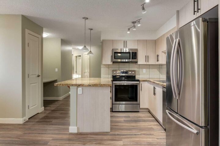 Property Photo:  108 Country Village Circle NE 301  AB T3K 0E3 