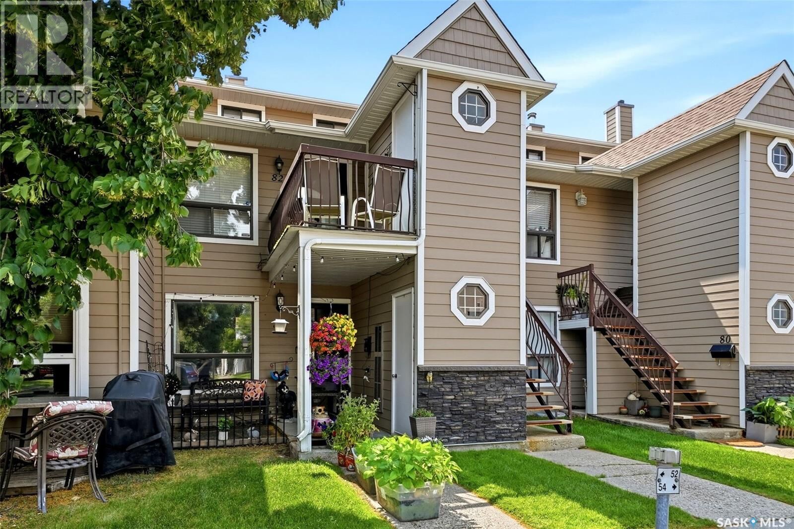 Property Photo: 82 Cedar Meadow Drive SK S4X 3J6