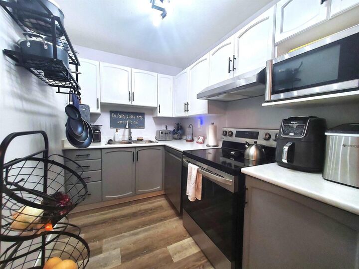 Property Photo: 2964 Trethewey Street 208 BC V2T 6P4