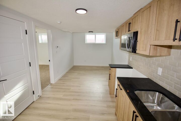 Property Photo: 8857 Carson Way SW Bsmt AB T6W 5B8