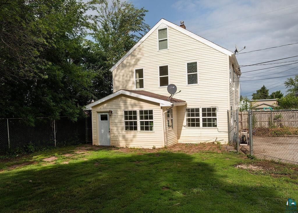 Property Photo:  1412 101st Ave W  MN 55808 