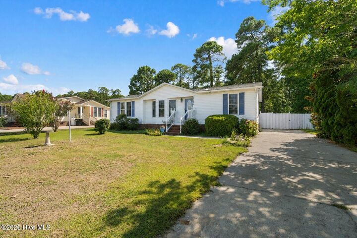 Property Photo:  1115 Captains Court  NC 28467 
