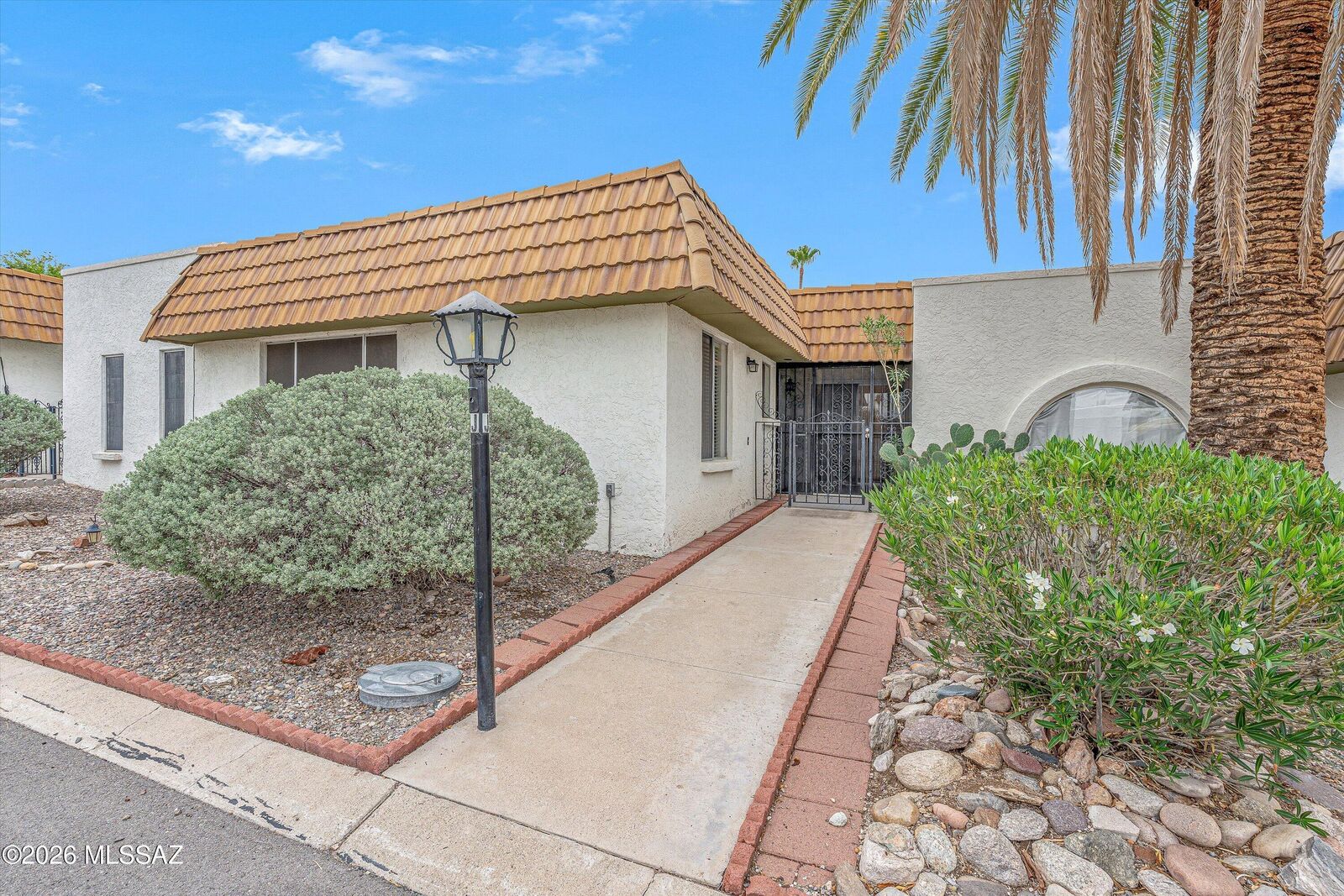 Property Photo:  660 E River Road J  AZ 85704 