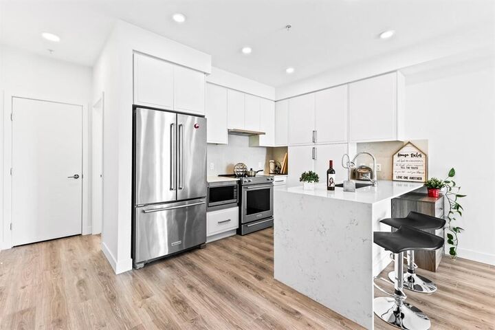 Property Photo: 700 Clarke Road 505 BC V3J 0K5