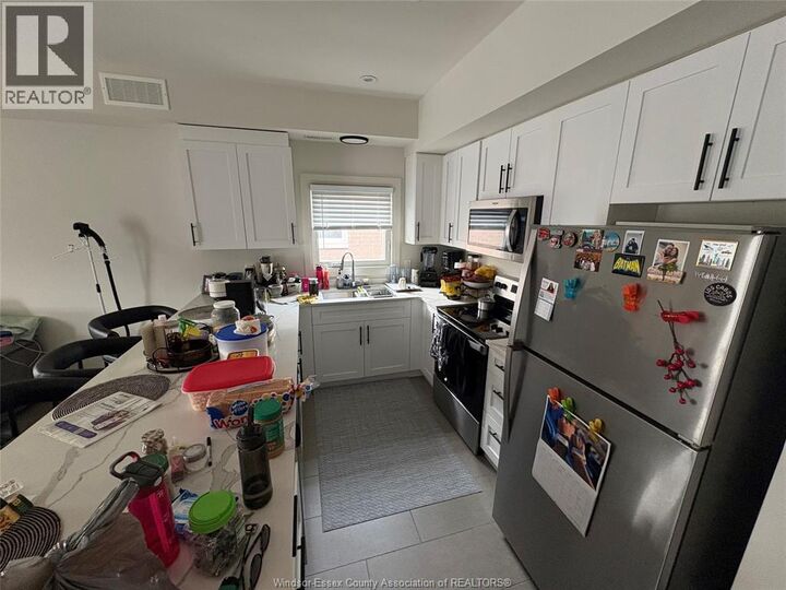 Property Photo:  233 Watson 106  ON N8S 3R8 