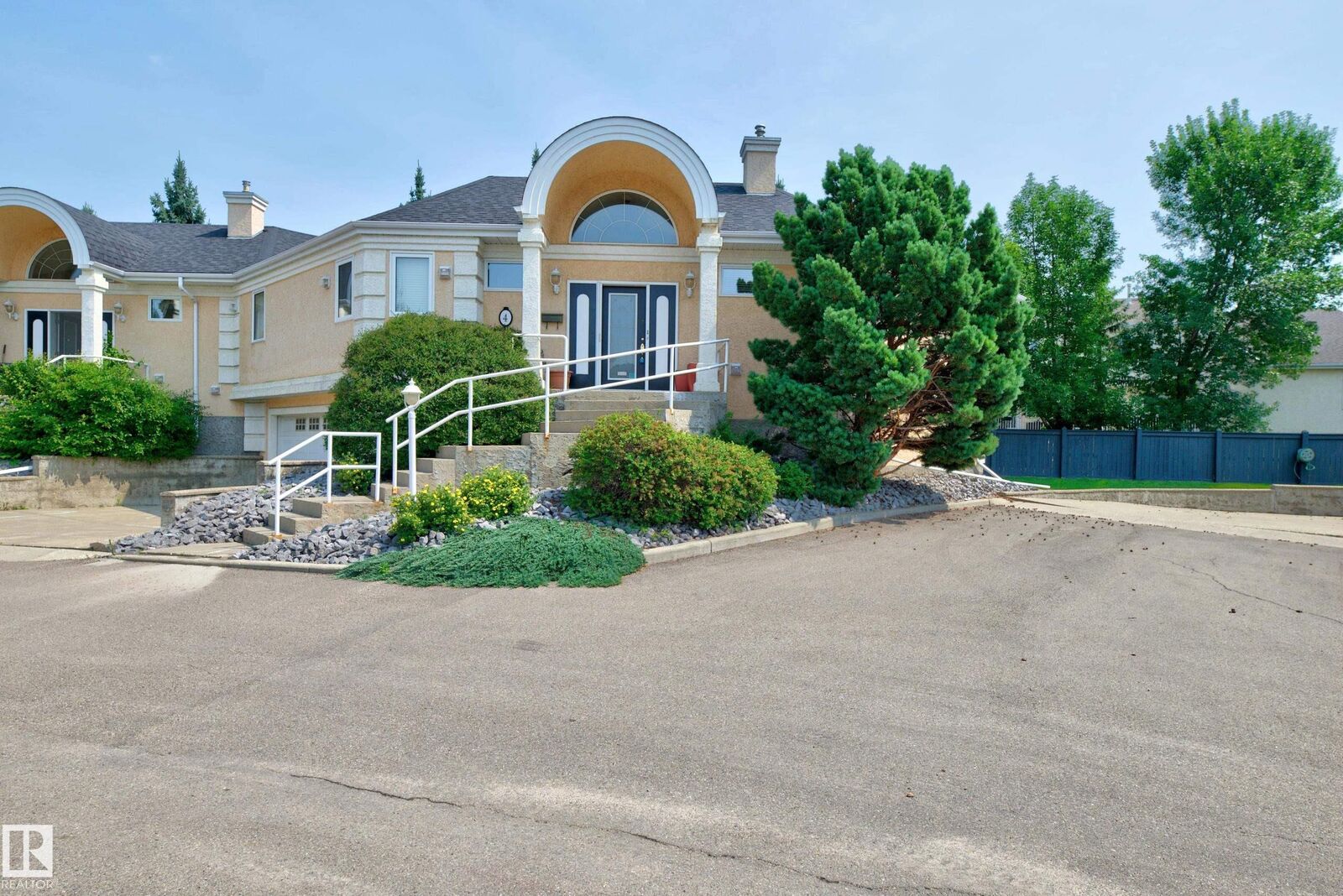Property Photo:  11809 9B Avenue NW 4  AB T6J 7B6 