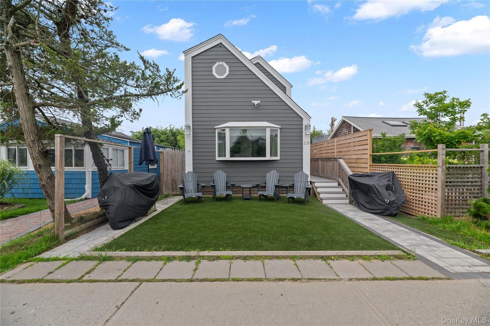 Property Photo: 29 Bungalow Walk NY 11770