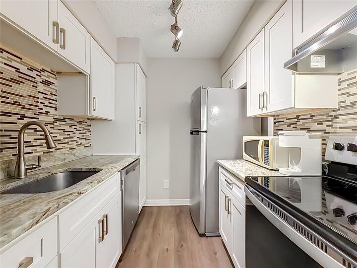 Property Photo:  305 Wymore Road 205  FL 32714 