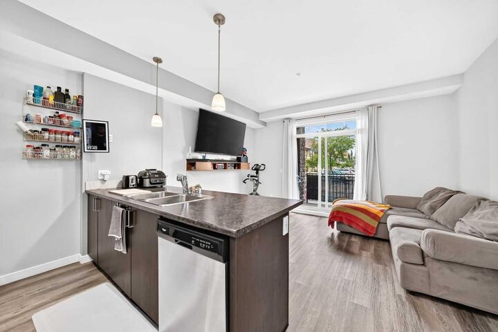 Property Photo:  117 Copperpond Common SE 101  AB T2Z 5E2 