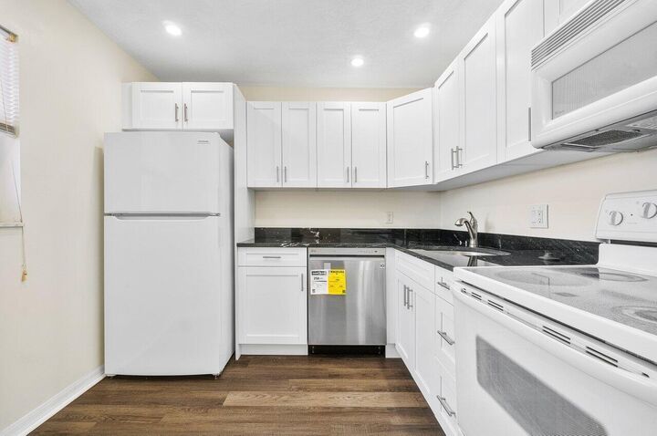 Property Photo:  2615 NE 1st Court 407  FL 33435 