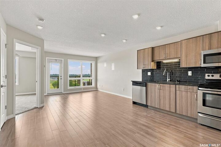 Property Photo:  915 Kristjanson Road 320  SK S7S 0B1 
