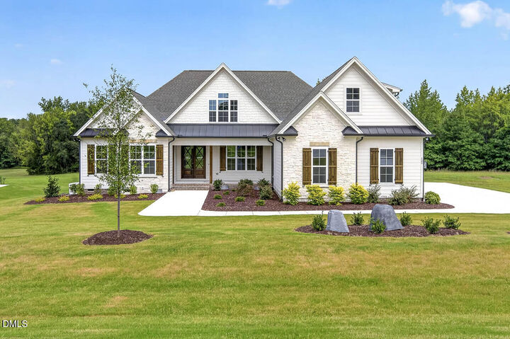Property Photo:  125 Water Willow Drive  NC 27597 