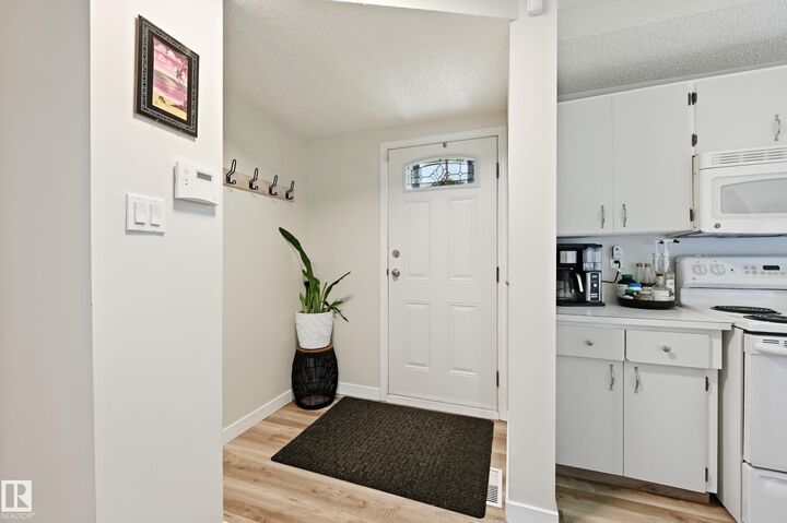 Property Photo:  5677 137 Avenue NW  AB T5A 2H4 