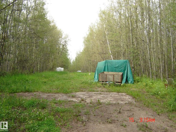 Property Photo: 465031 Rge Road 21 AB T0C 2V0