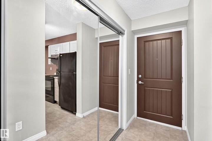 Property Photo:  13907 136 Street NW 218  AB T6V 1Y5 