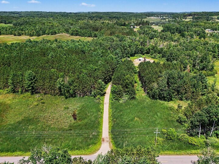 Property Photo:  9638 8 Mile Road  MI 49645 