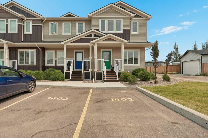 Property Photo: 210 Firelight Way W 1402 AB T1J 5T3