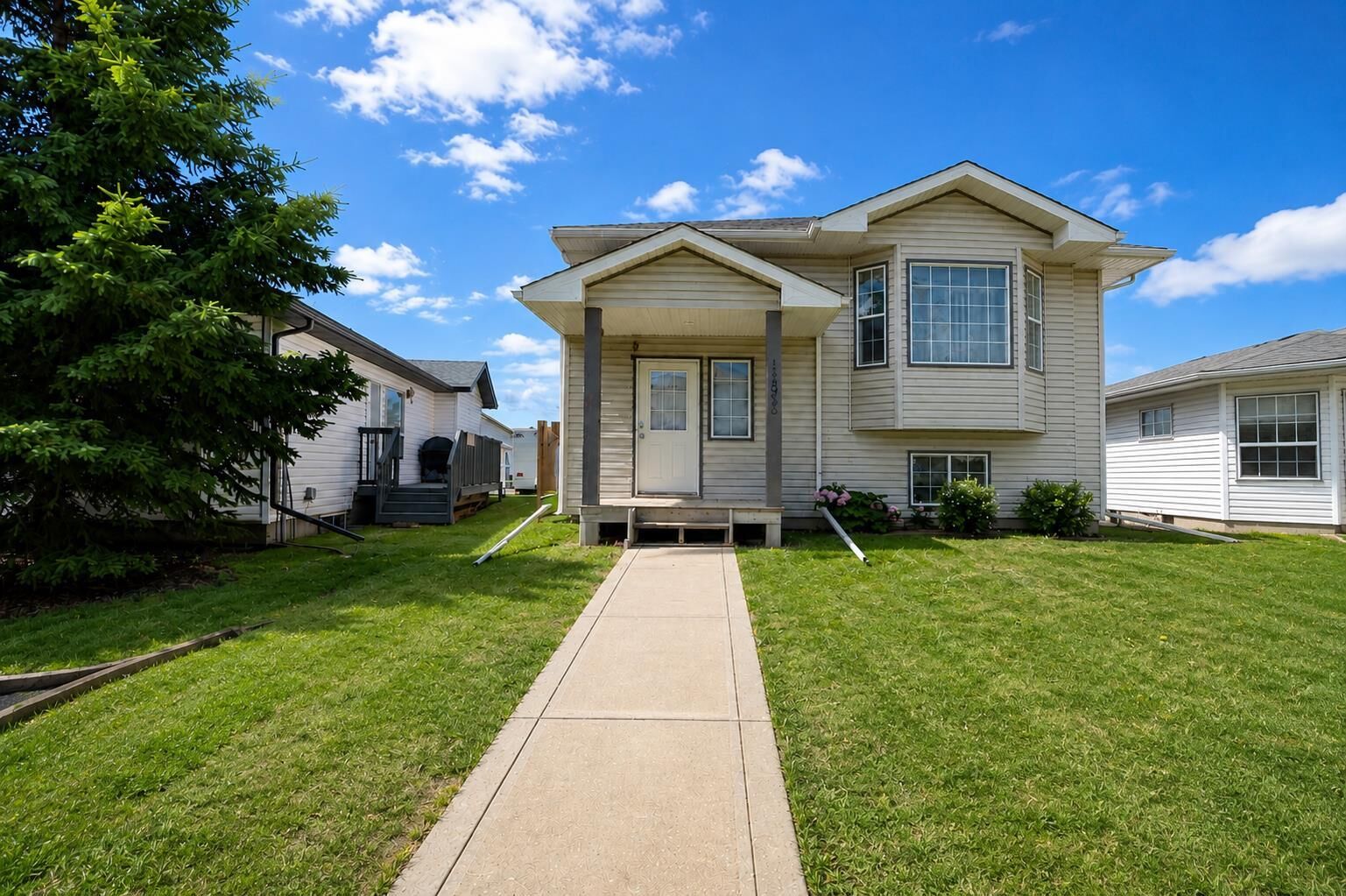 Property Photo: 12830 94 Street AB T8X 1R2