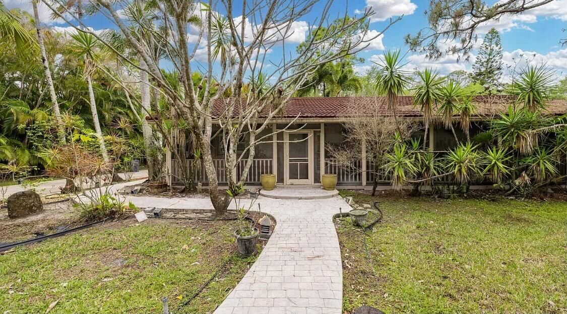 Property Photo: 13265 41st Lane N FL 33411