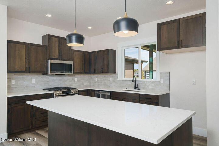 Property Photo:  7379 N Breaux Drive  ID 83815 