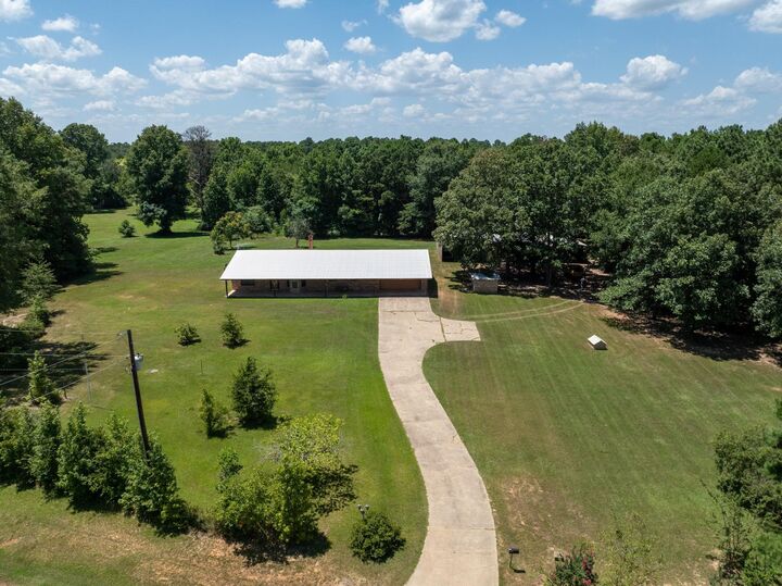 Property Photo: 1896 County Road 4117 TX 75551