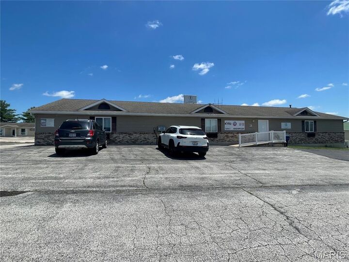 Property Photo: 120 E Avenue Apt A MO 63389