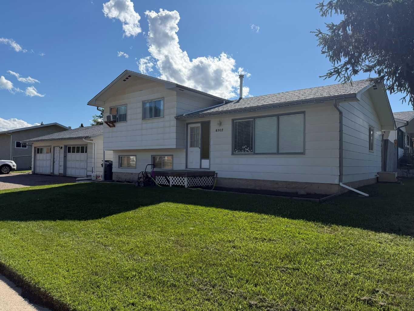 Property Photo:  8302 98 Street  AB T8S 1A4 
