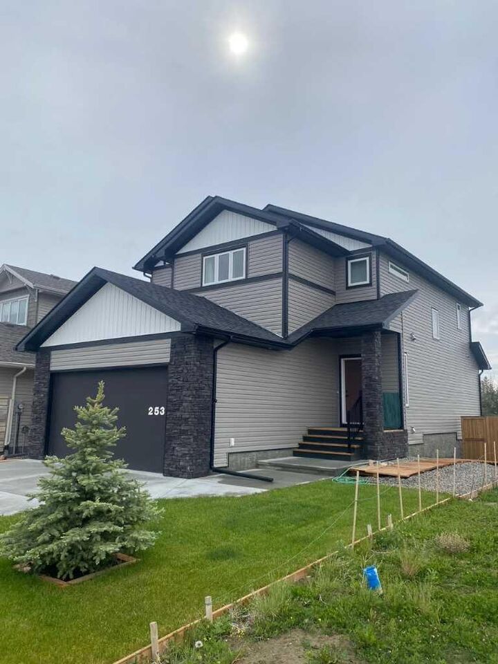 Property Photo: 253 Rivergrove Chase W AB T1K 8H8