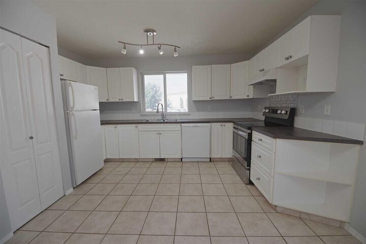 Property Photo: 156 Jerry Potts Boulevard W AB T1K 7G7